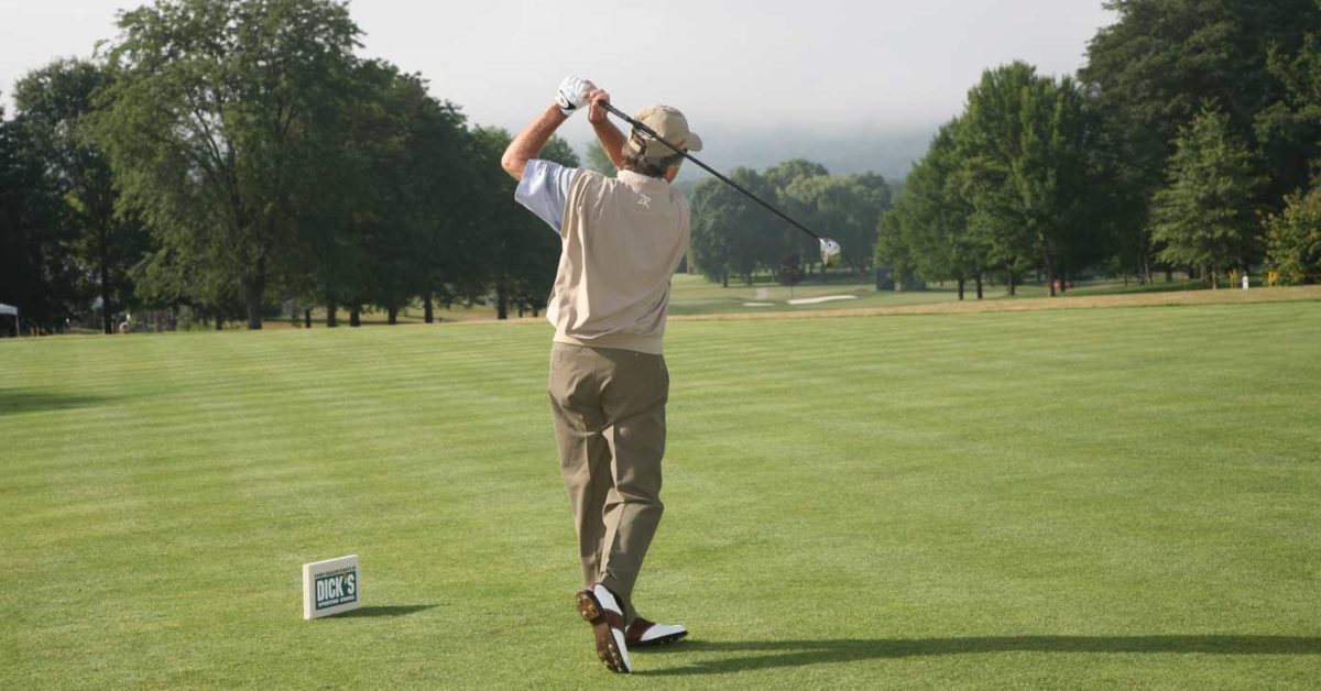 Golfer swinging