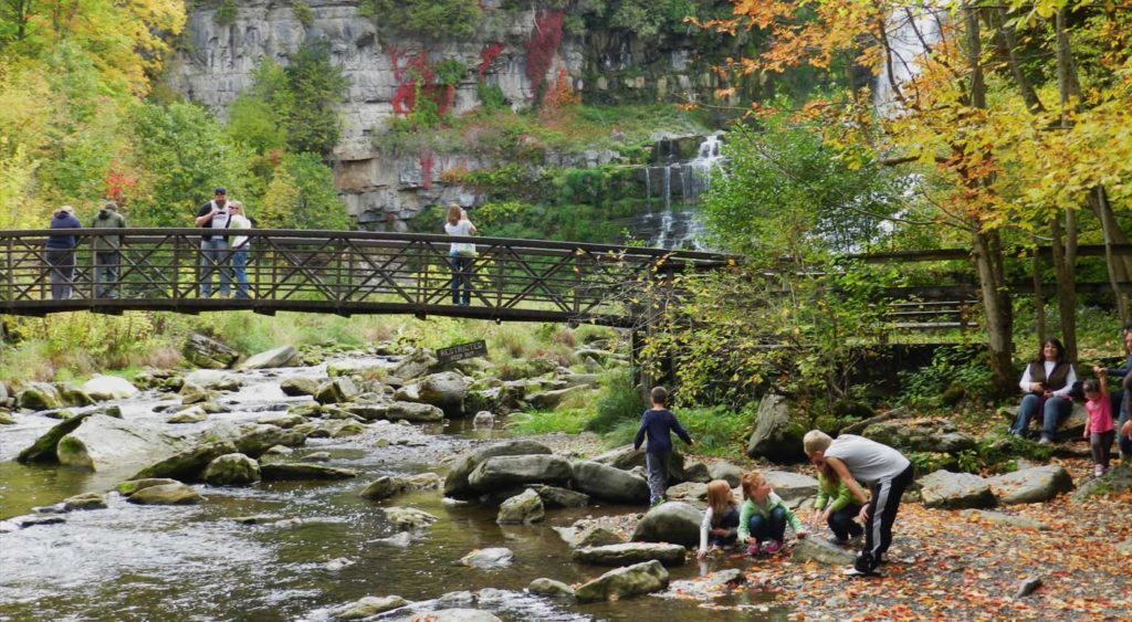 People near a waterfall