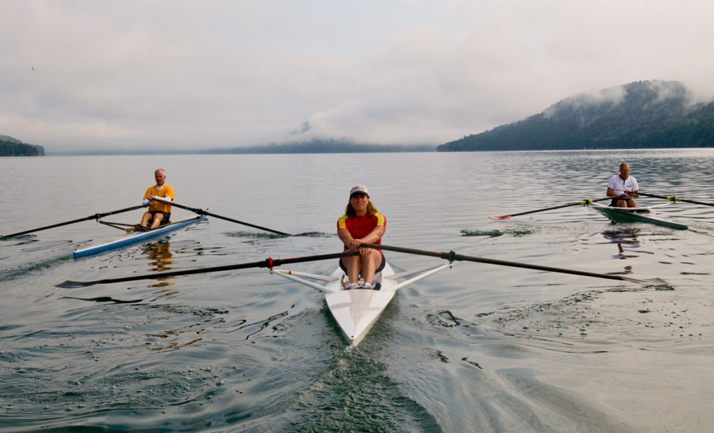 People using single scull boats