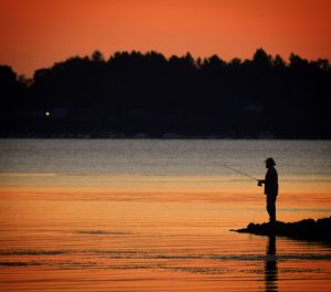 Man fishing in Delta Lake